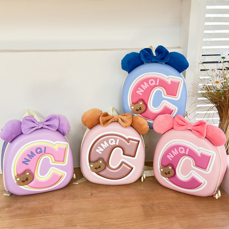 Sweet and cute bow bow boys' and girls' backpacks for kindergarten and primary school students, 2025 new eggshell children's bags full figure
