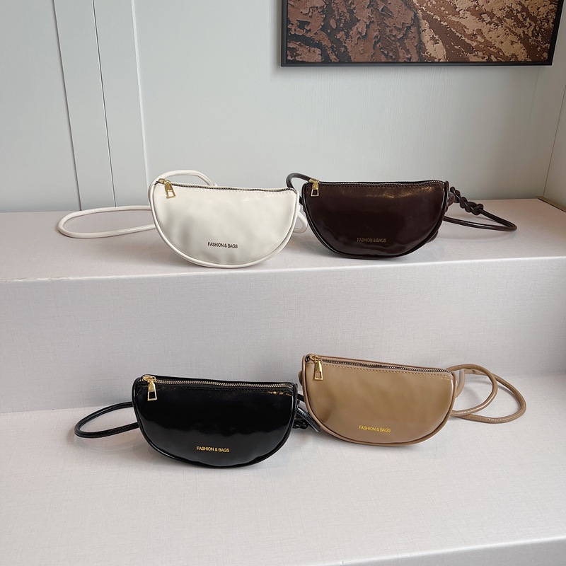 The high-end patent leather half-moon bag for women in the spring of 2025 is a niche design. It features a single-shoulder crossbody bag that is popular for going out like dumplings Application Scenario