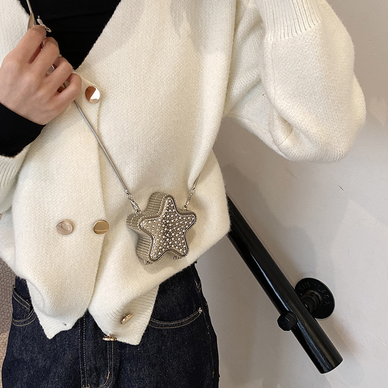 The Star Bag is a niche design mini box bag for women. It's a new 2024 chain handbag and a stylish single-shoulder crossbody bag details Picture