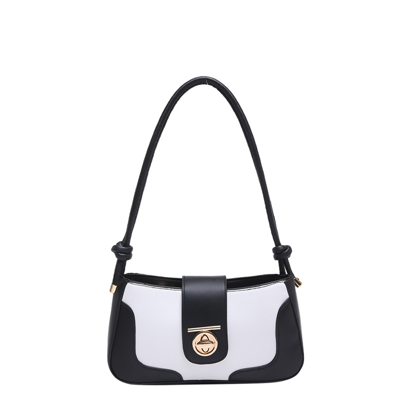A trendy single-shoulder underarm bag with contrasting colors and a unique style for women's 2024 winter, featuring a stylish and individualistic crossbody crescent moon bag Item Picture