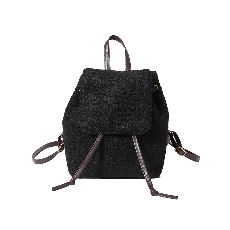 This new winter backpack is a stylish hand-held woolen bag for women's commuting. It is small, artistic, retro and versatile. It is a single-shoulder crossbody bag Item Picture