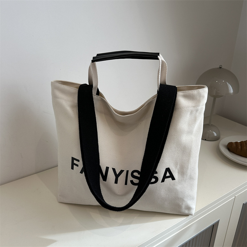Commuting retro large-capacity letter bag for women, 2024 new winter single-shoulder bag, college student class tote bag full figure