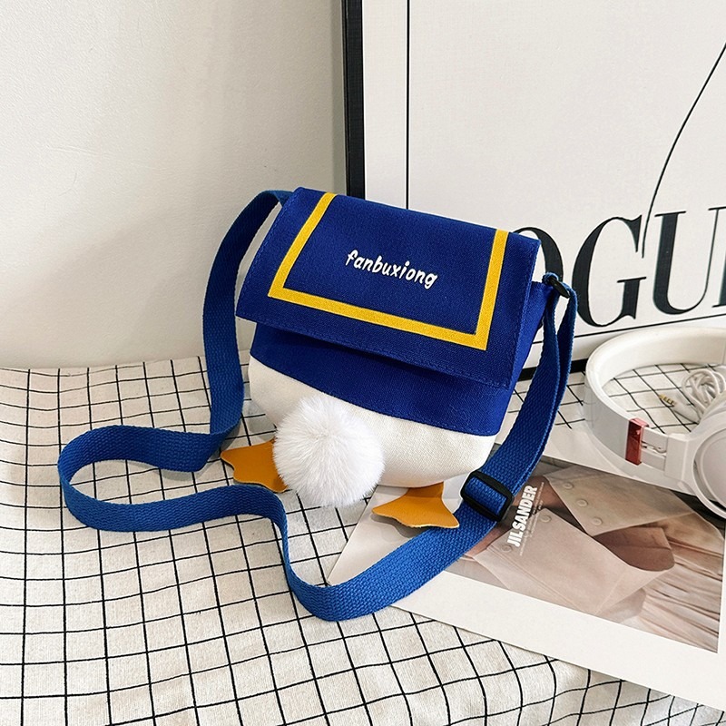 This trendy canvas small bag is cute and playful for girls. It's a fashionable and versatile single-shoulder bag with a duck bottom. It's a casual crossbody small backpack details Picture