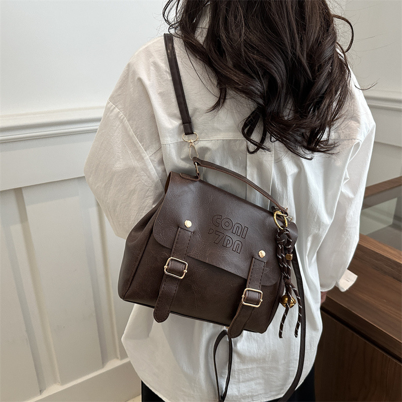 Chao Letter hand-held simple and stylish solid color multi-functional backpack 2025 New large-capacity women's bag, trendy full figure