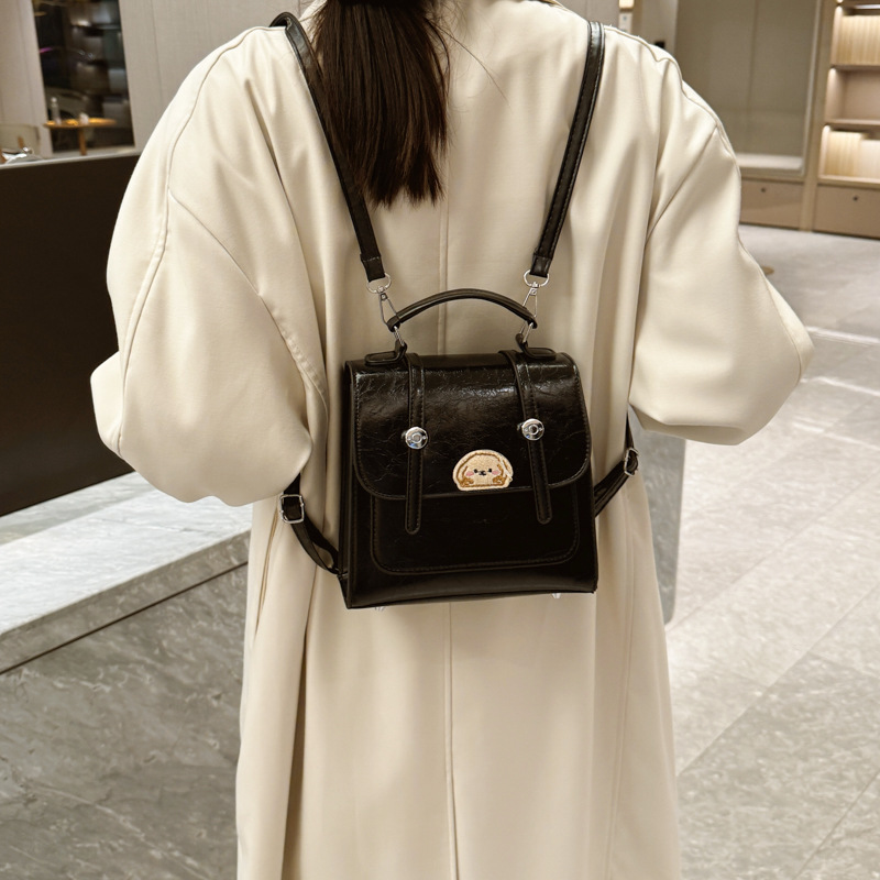 The new red versatile small bag for women's backpacks in the autumn of 2024 features a unique design that is stylish and fashionable for commuting details Picture