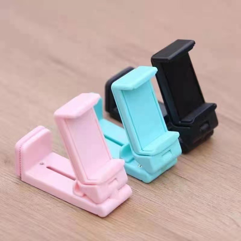 Cross-border desktop lazy person mobile phone stand, lift, fold, rotate, clamp, multi-functional adjustment, freely clamp, universal stand Application Scenario