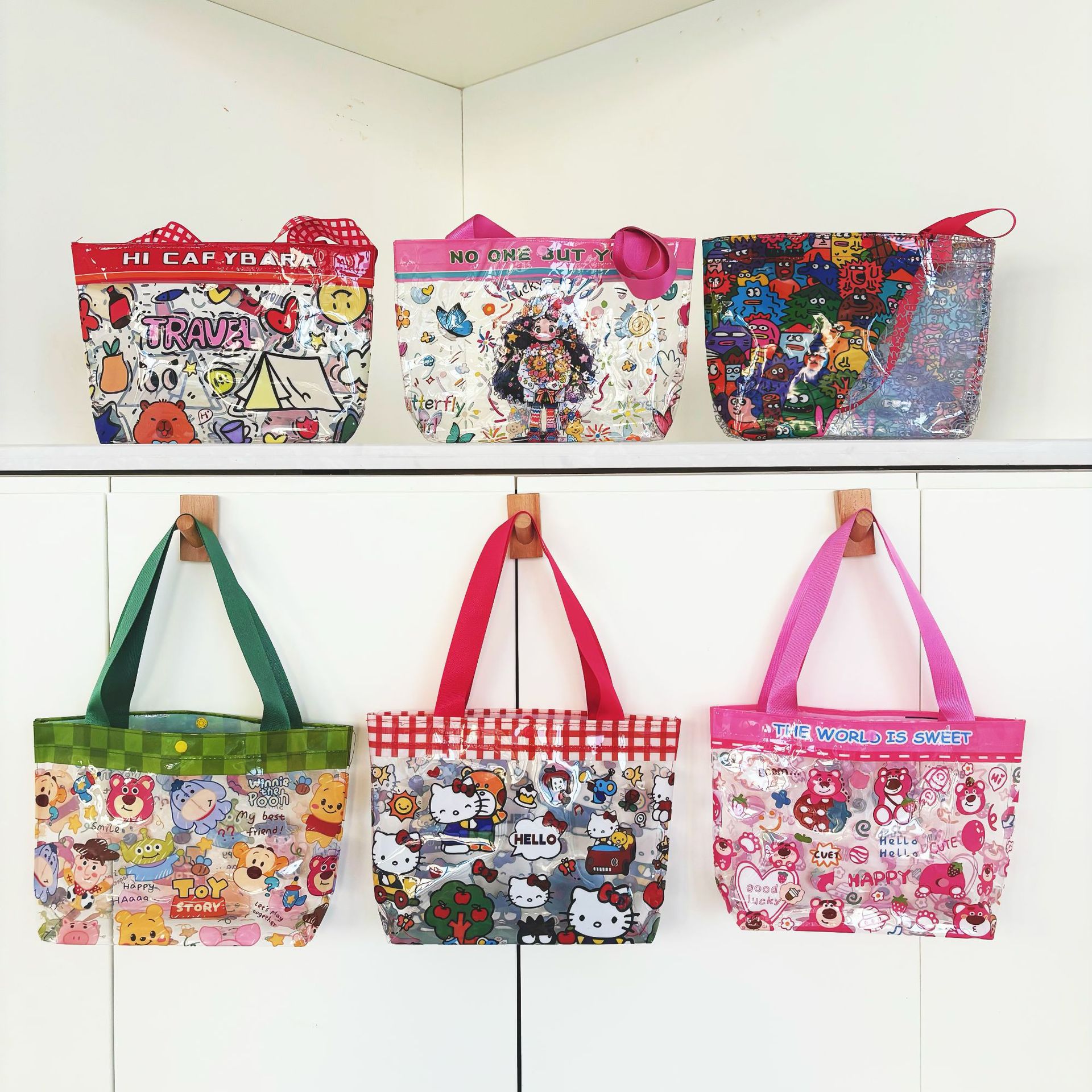 PVC fabric cute kitty cat transparent handbag, high appearance level cartoon shopping bag, printed lightweight handbag for women full figure