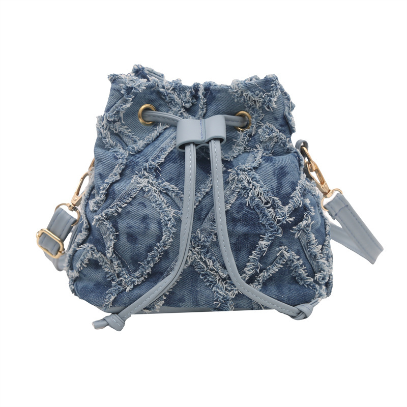 Diamond-shaped mini bucket bag 2025 Spring New Style simple crossbody bag for women, European and American trend drawstring tassel single-shoulder bag Item Picture