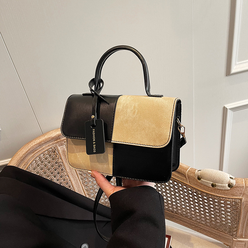 The new 2024 winter collection features a niche design with color-blocking and patchwork hand-held small square bag, a Korean-style fashionable, simple and retro single-shoulder bag full figure