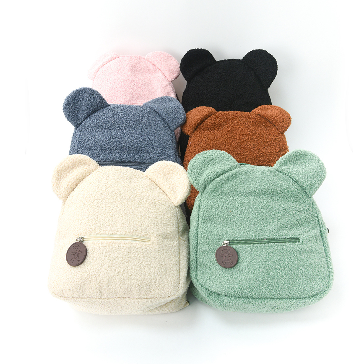 The 2025 new style of popular, fashionable and casual plush backpack for foreign trade is a cartoon children's backpack with ears and little bear full figure