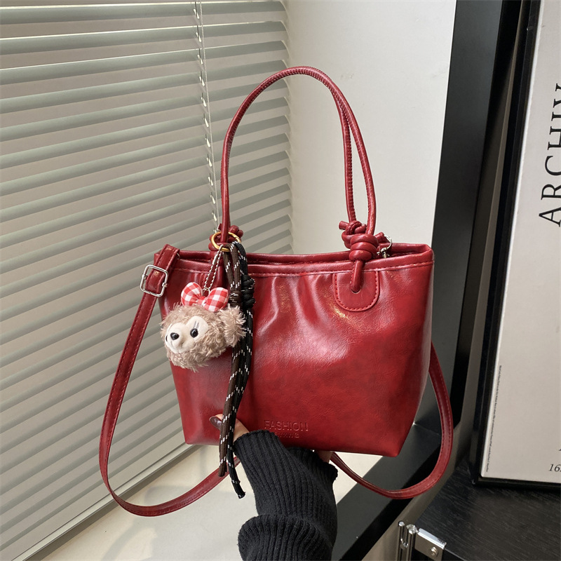 Winter solid-color Tote bag for women, 2024 new single-shoulder fashionable and versatile crossbody bag, high-end hand-held bucket bag full figure