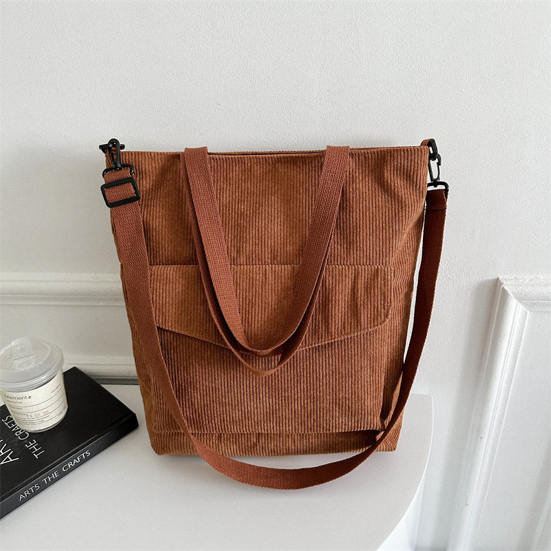 The 2025 new style of stylish and elegant design, single-shoulder crossbody, solid color retro zipper underarm textured tote bag full figure