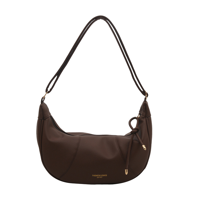 This crossbody bag is a solid-color one with a retro, fashionable and versatile design. It features a hand-held dumpling bag for women, a new Korean version single-shoulder bag Item Picture