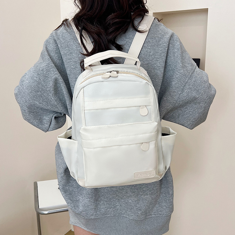 2025 New European and American retro college student canvas bag, large-capacity backpack, fashionable and versatile commuting crossbody bag details Picture