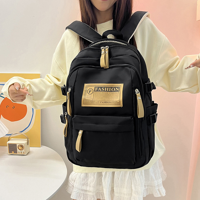 2025 New model of backpack for junior and senior high school students, schoolbag for female college students, large-capacity, multi-functional, casual and outdoor backpack full figure