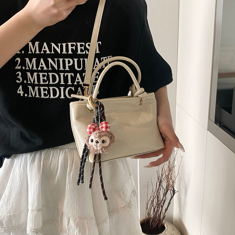 Spring 2025 new style fashionable retro texture solid color commuter single-shoulder crossbody bag, minimalist hand-held bucket bag Specification drawing