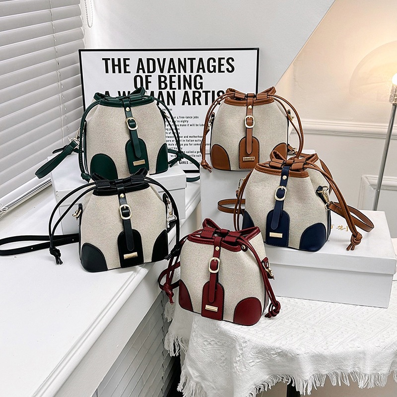 Cross-border foreign trade women's 2023 new Korean-style canvas patchwork color-blocking drawstring bucket bag with fashionable and niche design Application Scenario