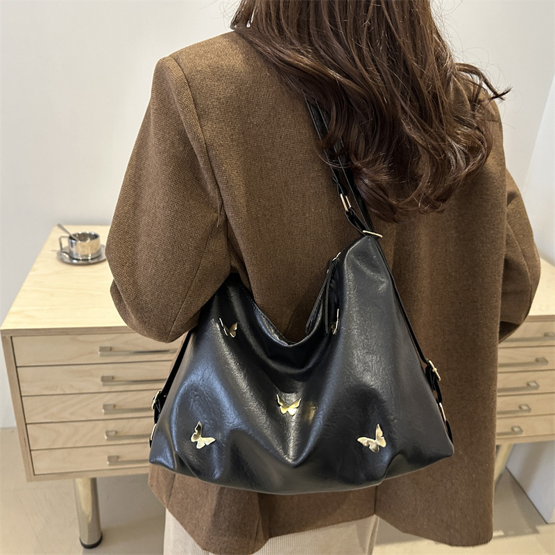 2024 New winter commuting solid color large-capacity multi-functional backpack, Butterfly hardware personalized single-shoulder crossbody bag Specification drawing