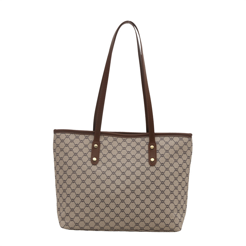 Commuting personalized large-capacity tote bag for women 2025 Spring New style, elegant and niche trendy single-shoulder bag for cross-border women Item Picture
