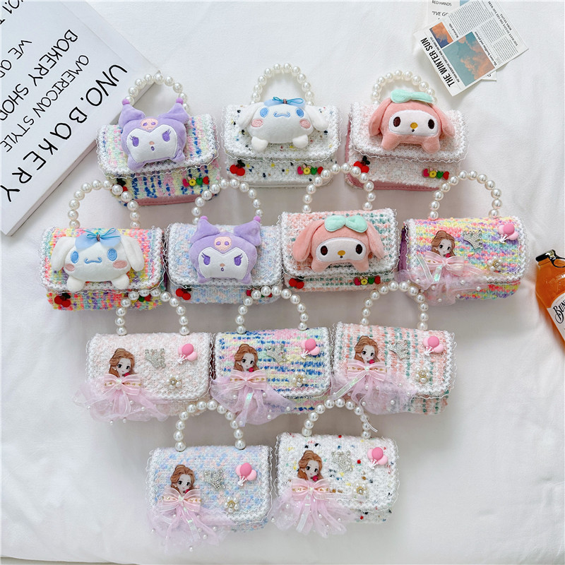 Children's pearl hand-held small crossbody bag 2024 New Year Edition woolen doll accessory single-shoulder bag Cute girl crossbody bag full figure