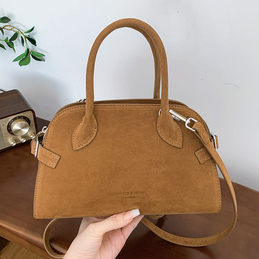 A new Korean version of fashionable and versatile single-shoulder bag with a frosted shell for women, 2024. A niche and high-end crossbody bag for women full figure
