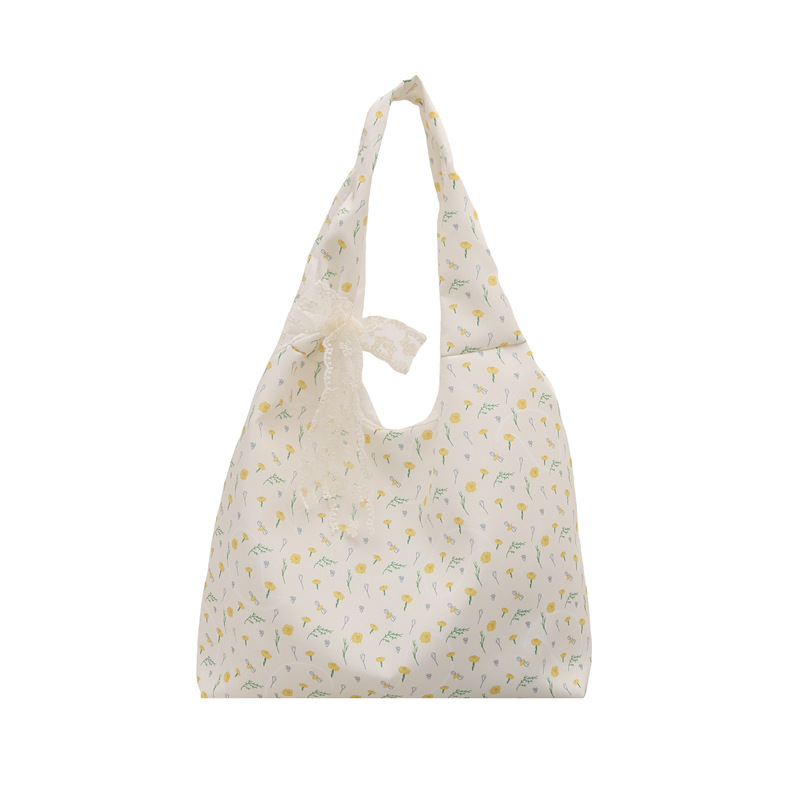 The 2025 summer new large-capacity single-shoulder commuter women's canvas floral print bag and versatile bow tote bag Item Picture