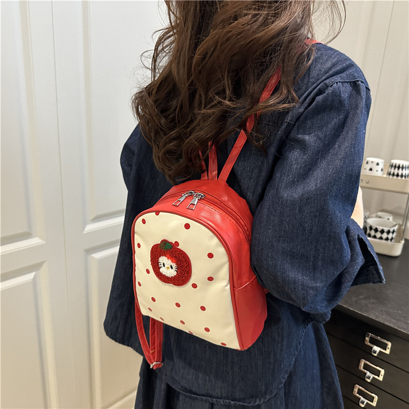 Cute Apple polka dot cat mini backpack for women 2025 New trendy and fashionable school-style backpack and handbag details Picture