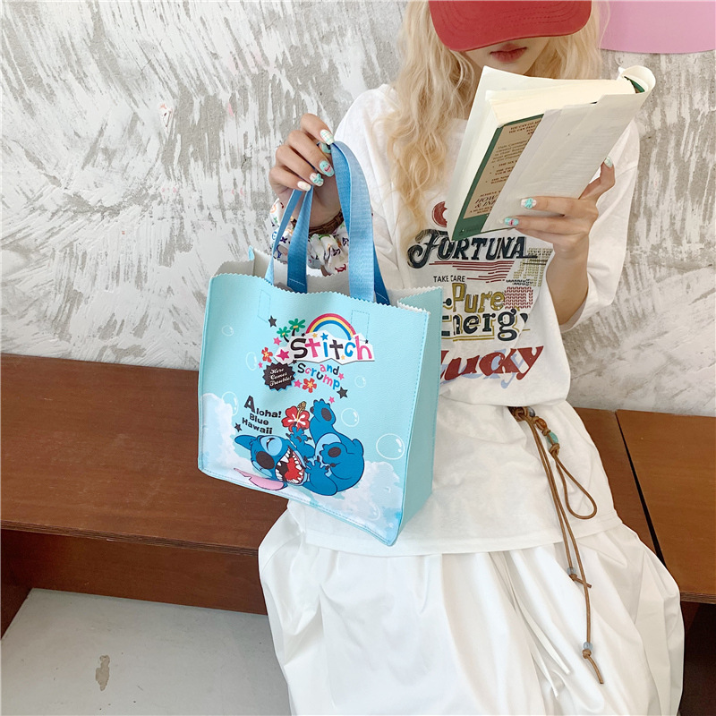 The 2025 new large-capacity student class tote bag features a cute cartoon style full figure