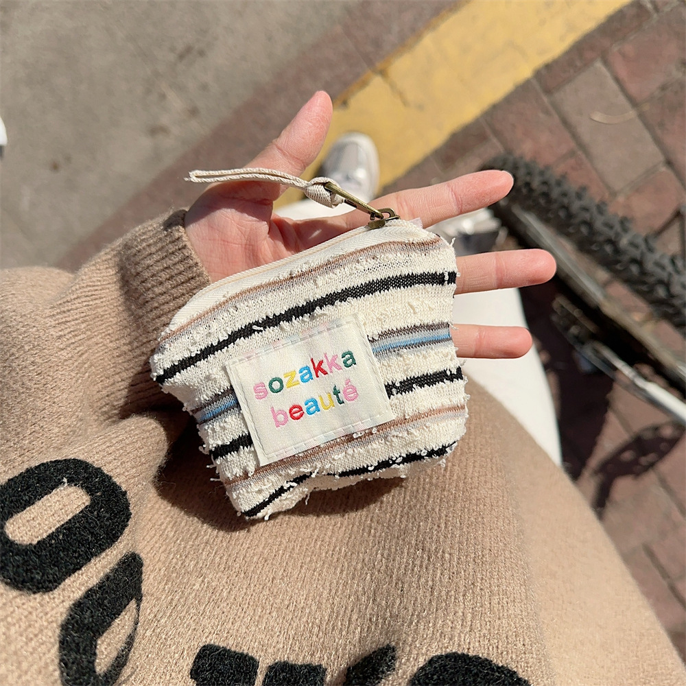 311112 Korean version large-capacity striped handbag, women's canvas bag, commuting cotton bag, single-shoulder crossbody bag, underarm bag Application Scenario