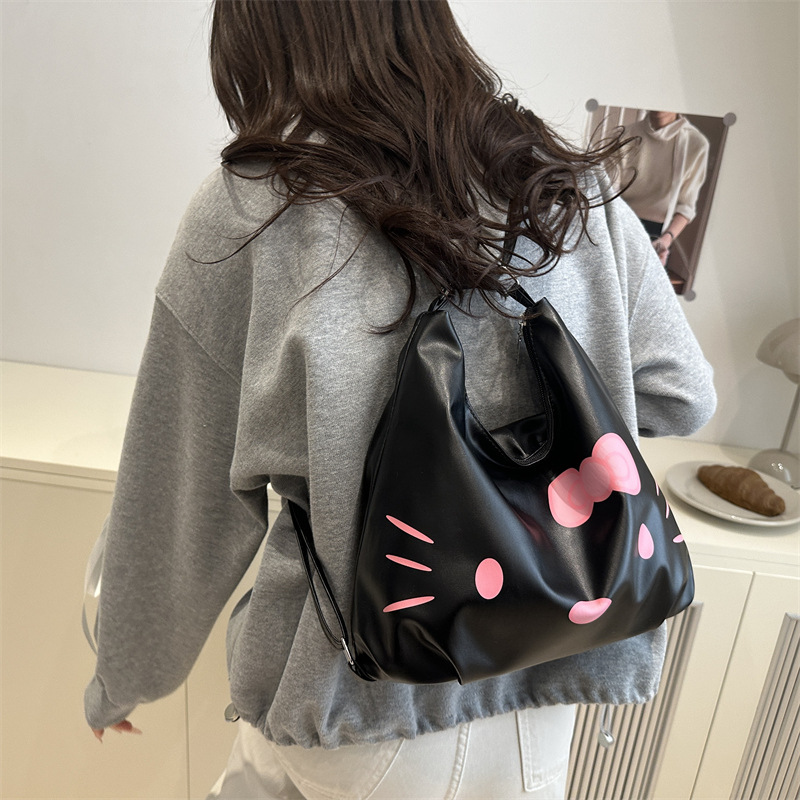 A new casual little cat fashion bag for women, a versatile commuter bag, a student single-shoulder crossbody bag, and a popular women's bag full figure