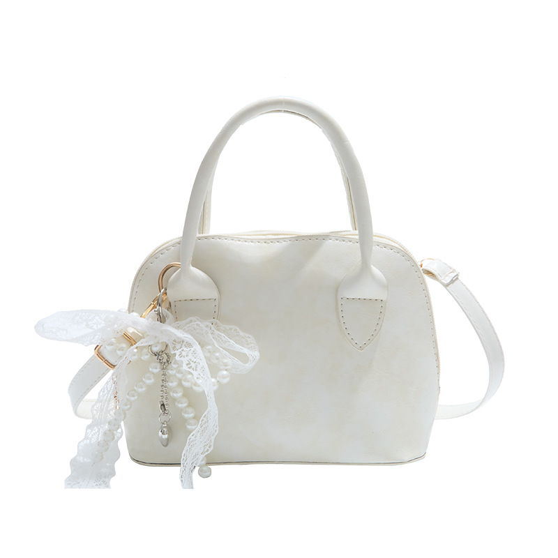 Korean version hand-held bowling bag for women 2025 new style, fashionable and simple pillow bag, versatile and casual single-shoulder crossbody bag Item Picture