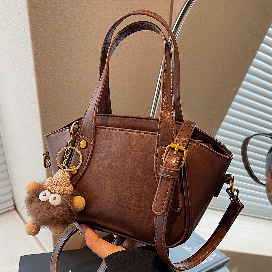 Simple and versatile hand-held bucket bag for women, 2024 new fashion trend single-shoulder bag, high-end and niche design crossbody bag full figure