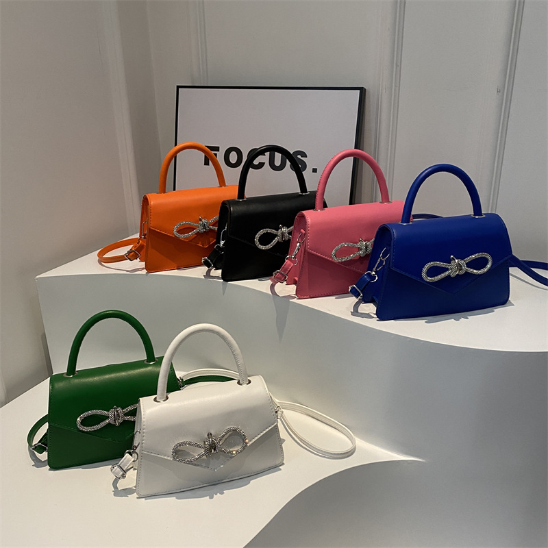 Korean-style simple solid color bow stitching girl's bag, fashionable crossbody single-shoulder hand-held small bag, casual women's bag Application Scenario