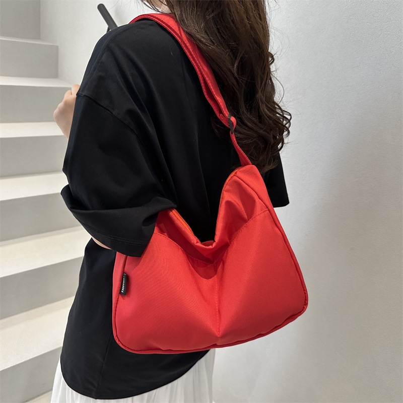 2025 New casual crossbody canvas bag, simple and large-capacity single-shoulder bag, niche design sense daily commuting bag Specification drawing