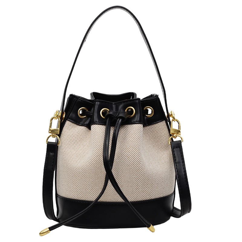 Retro canvas handbag for women, 2025 new niche design bucket bag, simple and versatile single-shoulder crossbody bag for women Item Picture