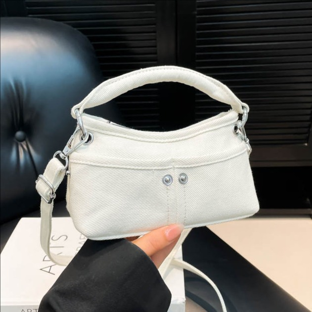 The 2025 new fashionable portable hand-held small square bag is a simple solid-color single-shoulder bag for women and a versatile multi-pocket crossbody bag full figure