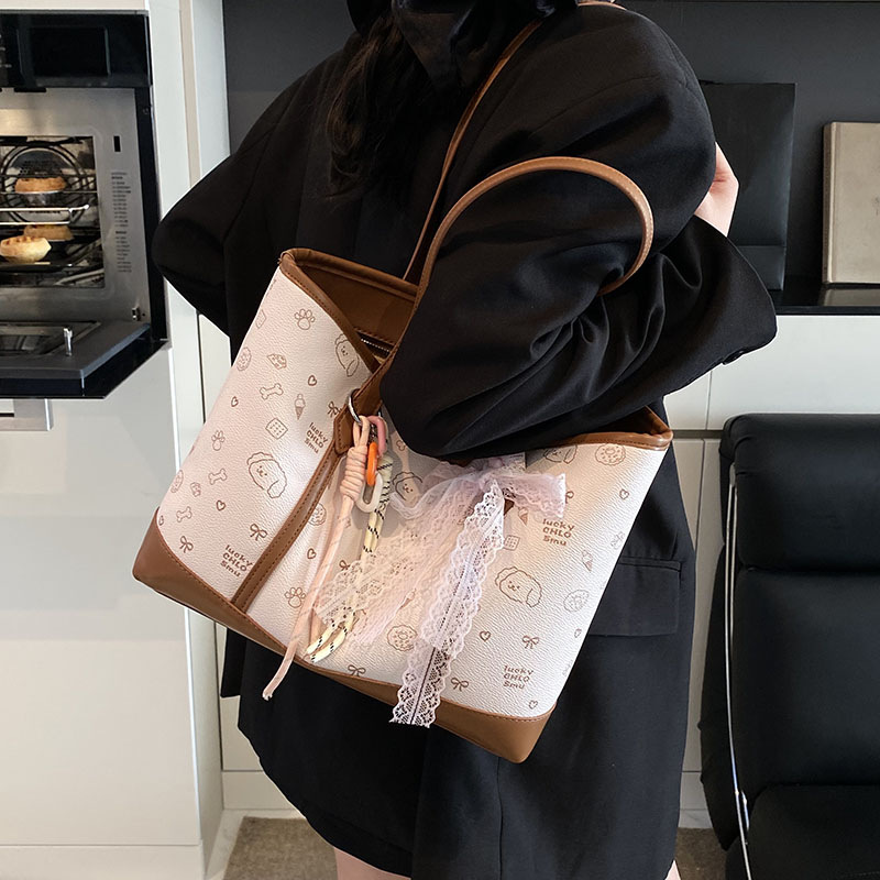 A popular retro print color-blocking hand-held tote bag for women, a new 2025 casual large-capacity single-shoulder bag for commuting to work details Picture