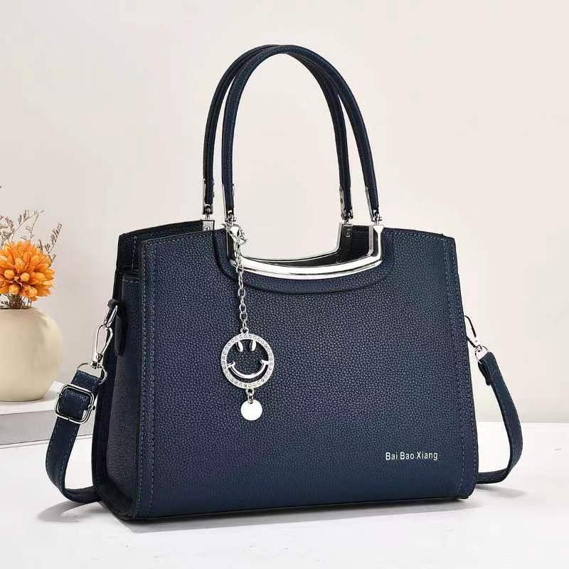 The new macaron handbag is a fashionable and trendy cross-border versatile women's bag with a high-end feel. It features a large capacity single-shoulder bag and a crossbody bag Application Scenario