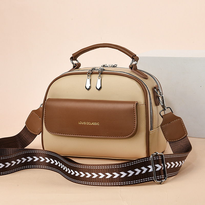 The new 2025 trendy women's bag, a Korean-style single-shoulder crossbody bag with contrasting colors, is a simple and elegant women's pillow bag details Picture