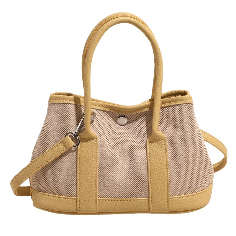2025 New color-blocking canvas handbag, women's large-capacity commuter single-shoulder tote bag, casual and versatile crossbody bag Item Picture