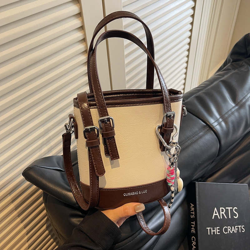 This year, there is a trend of niche, high-end, simple bucket bags for work, trendy, versatile and fashionable single-shoulder crossbody bags full figure