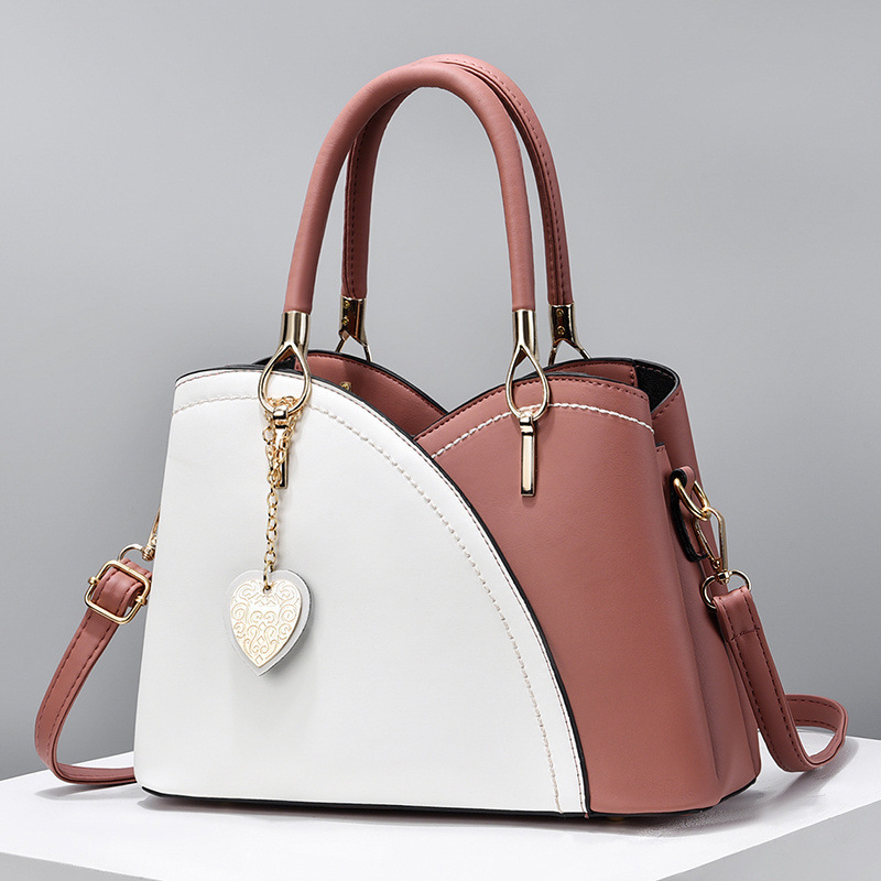 The 2022 new color-blocked fashionable commuter women's bag, a trendy single-shoulder, crossbody, hand-held tote large bag for cross-border trade details Picture