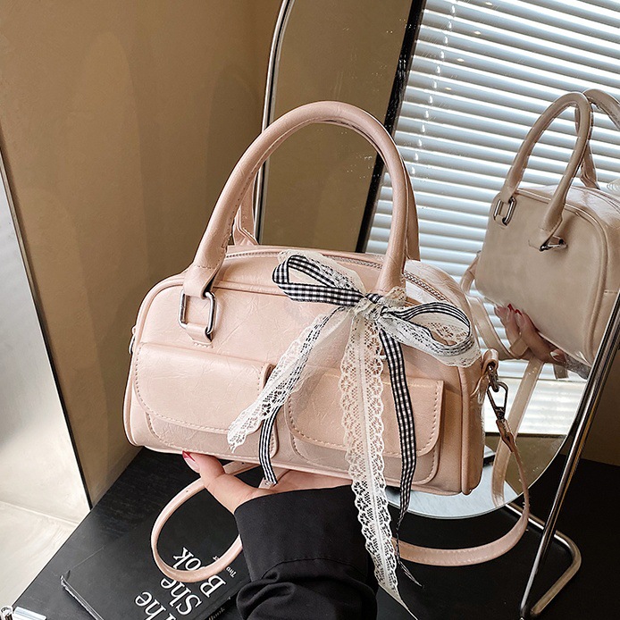 Cross-border casual hand-held Boston bag for women 2025 New Korean style simple and versatile bow single-shoulder crossbody bag full figure