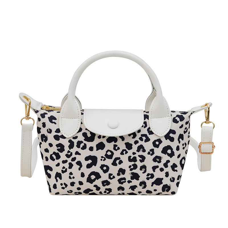The new leopard print underarm bag for the 2024 autumn and winter season is a cross-border trend hand-held shoulder bag with a color-blocking and patchwork dumpling bag Item Picture