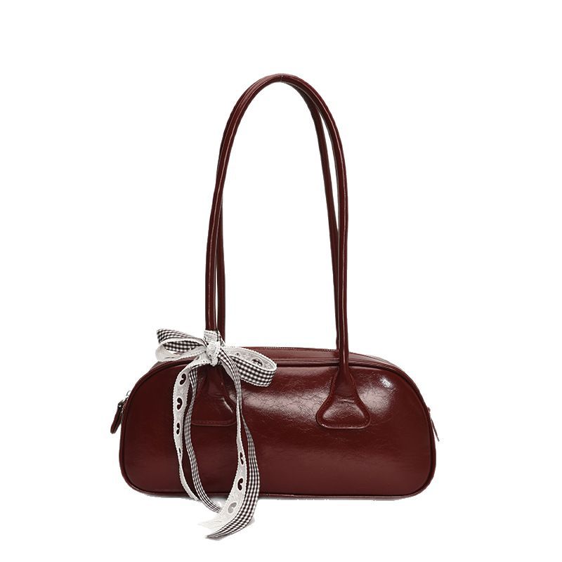 A niche bow handbag for women, a new trendy Korean-style textured underarm bag with a large capacity and pillow bag for the summer of 2025 Item Picture