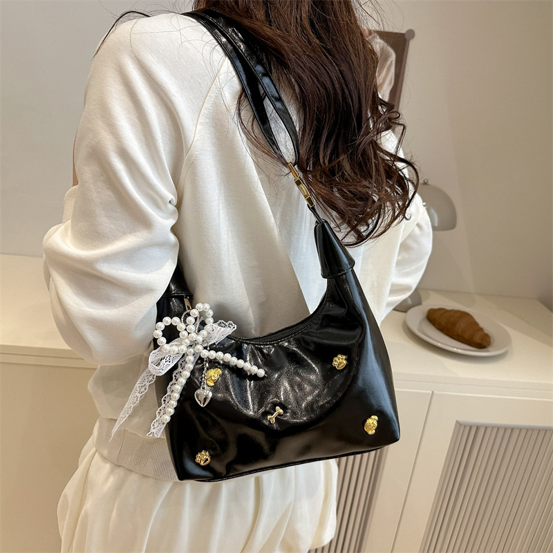 2025 New quality niche bag, women's spring trend fashion single-shoulder crossbody bag, women's hand-held dumpling bag details Picture