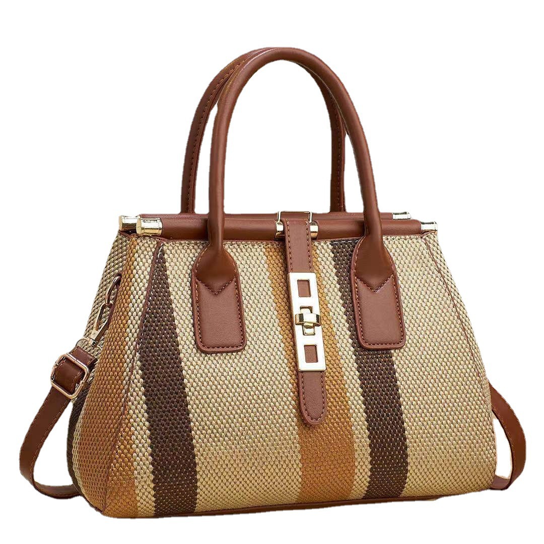 The 2023 new style of women's bag made of faux woven canvas material is noble and fashionable, with contrasting colors. It is a large-capacity cross-border bag for single-shoulder, crossbody and hand-carry Item Picture