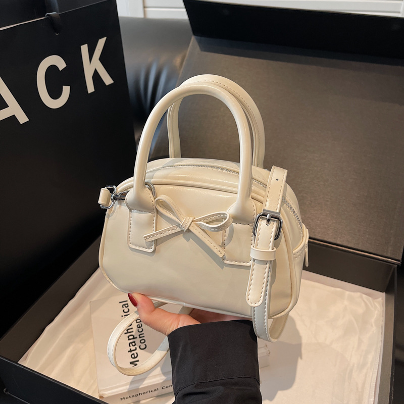 Korean style Instagram niche design, fashionable and simple, bow design, light luxury single-shoulder crossbody bag, hand-held ladies' small bag full figure