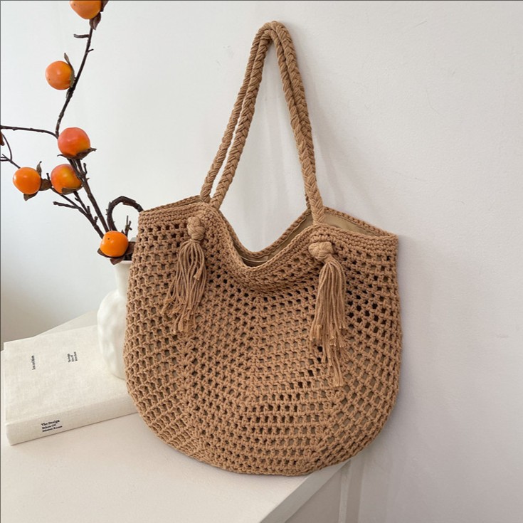 Versatile knitted hand-held underarm bag 2025 new style fashionable large-capacity bucket bag Seaside vacation beach single-shoulder bag full figure