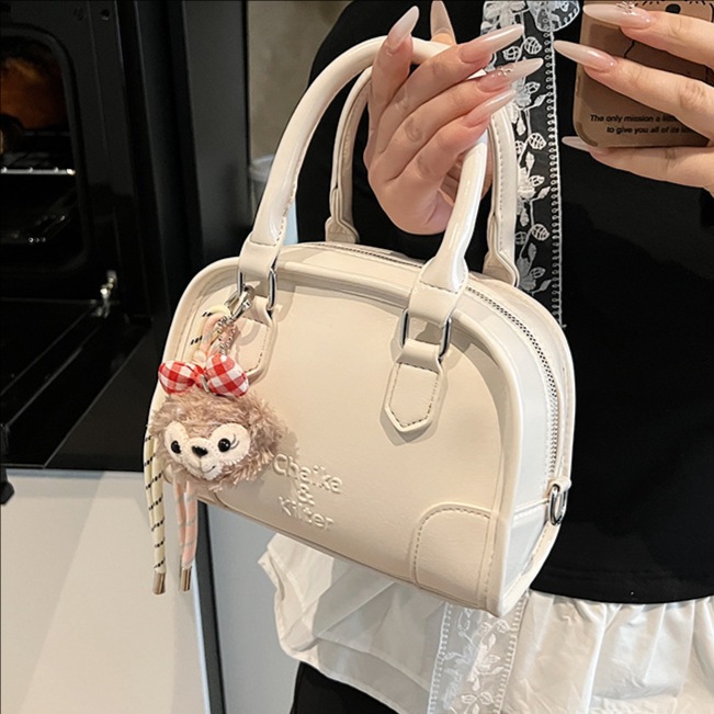 Korean style stylish and versatile Maillard hand-held pillow bag for women 2025 new casual and simple single-shoulder crossbody bag full figure
